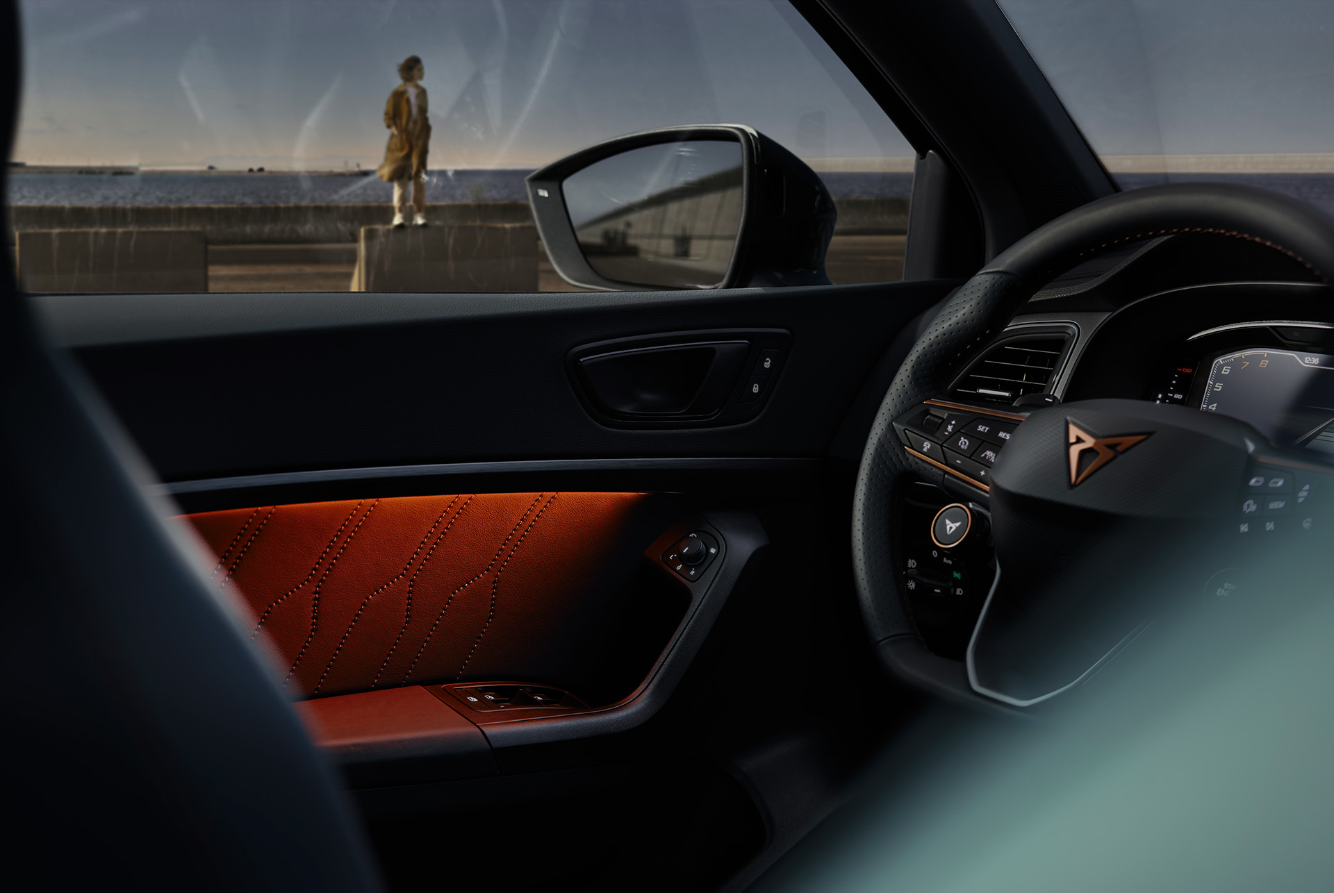 Interior view of the CUPRA Ateca showing ambient lighting that adjusts to your mood, enhancing the driving experience with customizable tones. 