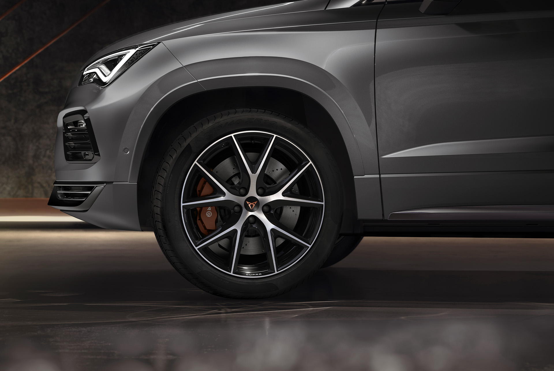 Close-up view of the 19-inch exclusive R sport wheels in black and silver on the CUPRA Ateca, featuring a sleek and sporty design.