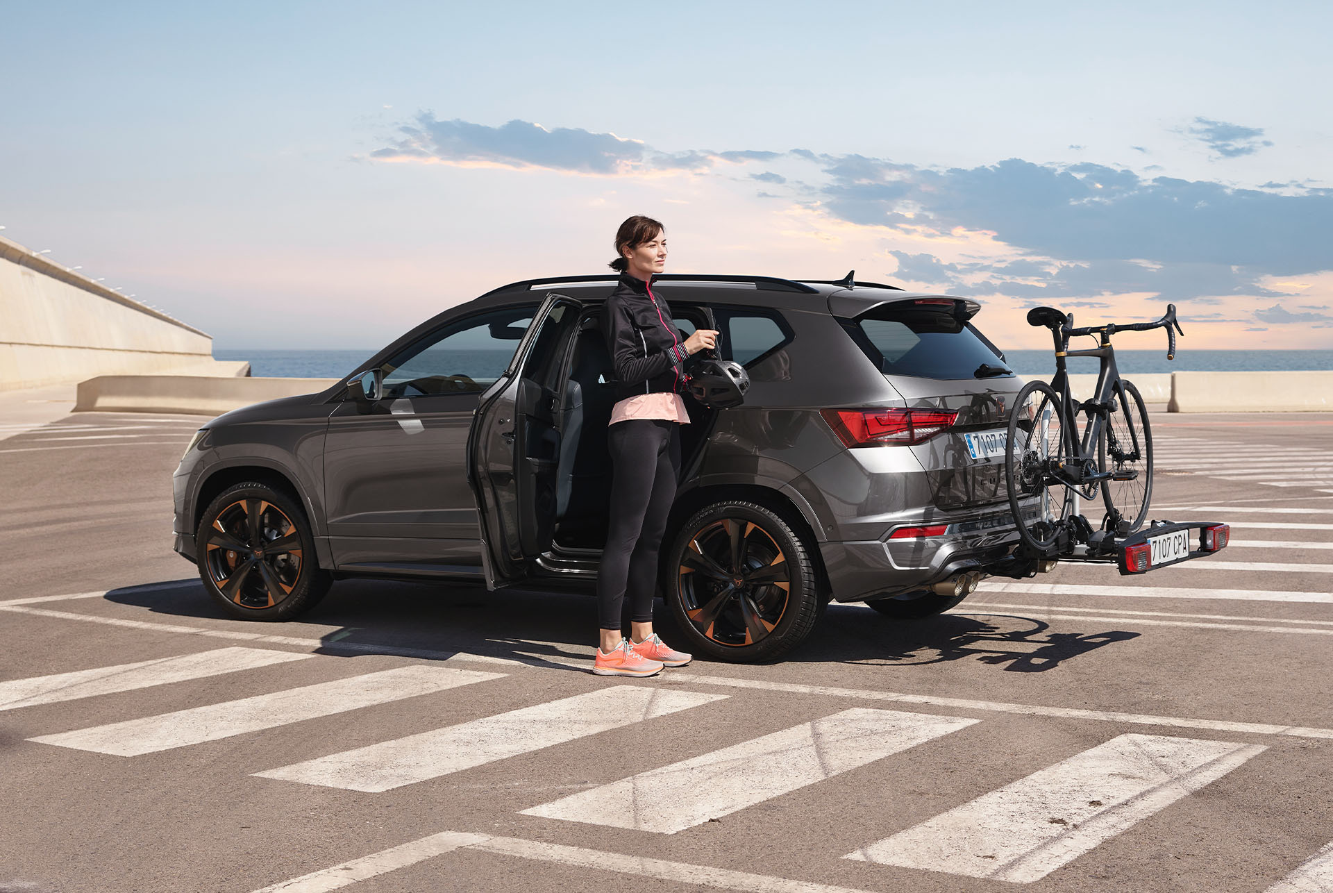 CUPRA Ateca with newly designed towing bike rack that fits up to two bikes, showcasing outdoor adventure capabilities.